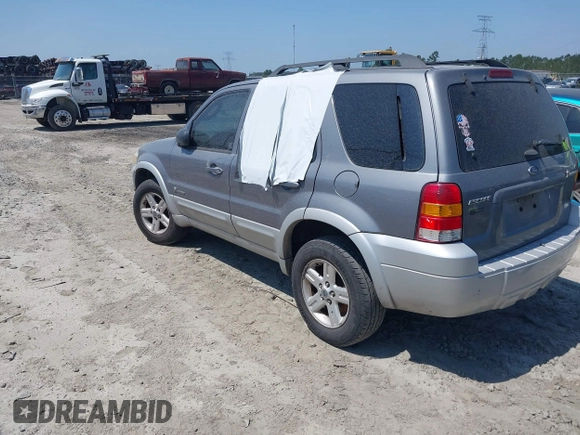 2007 Ford Escape Hybrid with VIN 1FMCU49H87KB34041, listed as a IAAI auction lot 42313413 with Not provided miles and . Bid and sale history available at DreamBid. Image 3.