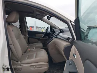 2016 Honda Odyssey EX-L with VIN 5FNRL5H68GB112223, listed as a IAAI auction lot 42056616 with 126,285 mi miles. Bid and sale history available at carsss.com. Image 5.