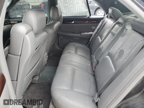 2002 Cadillac Seville Touring STS z VIN 1G6KY549X2U177791, wystawiony jako Copart lot #89313345 z przebiegiem 171 707 mil mil oraz Szkoda całkowita • Salvage title. Historia ofert i sprzedaży dostępna na DreamBid. Obrazek 10.