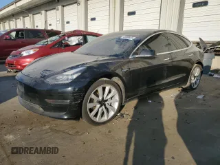 2019 Tesla Model 3 Mid Range with VIN 5YJ3E1EA9KF412525, listed as a Copart auction lot 48689825 with 134,768 mi miles and Salvage Title. Bid and sale history available at DreamBid. Image 1.