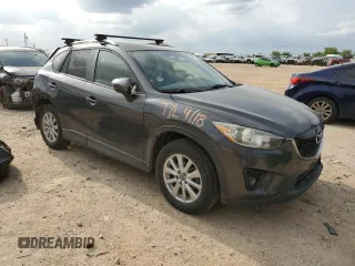2015 Mazda CX-5 Touring with VIN JM3KE4CY0F0517821, listed as a Copart auction lot 53937195 with 165,852 mi miles and Salvage Title. Bid and sale history available at DreamBid. Image 4.