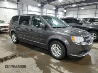 2015 Dodge Grand Caravan SXT with VIN 2C4RDGCG5FR622086, listed as a Copart auction lot 51769155 with 217,538 mi miles and Salvage Title. Bid and sale history available at DreamBid. Image 4.