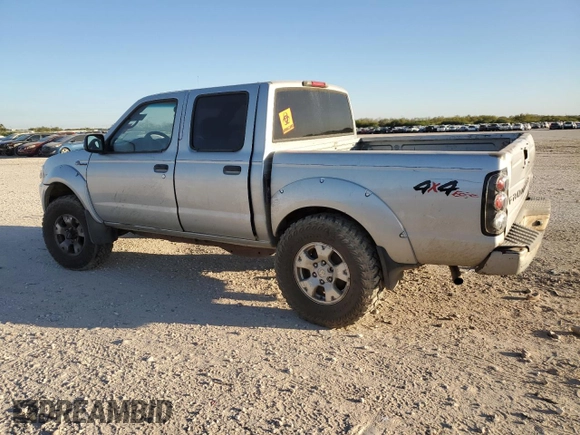 2003 Nissan Frontier SVE with VIN 1N6MD27Y43C432877, listed as a Copart auction lot 80243354 with Not provided miles and Salvage title. Bid and sale history available at DreamBid. Image 2.