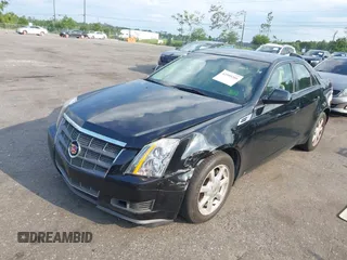 2008 Cadillac CTS RWD with VIN 1G6DF577680167610, listed as a IAAI auction lot 42595266 with 65,383 mi miles and . Bid and sale history available at DreamBid. Image 2.