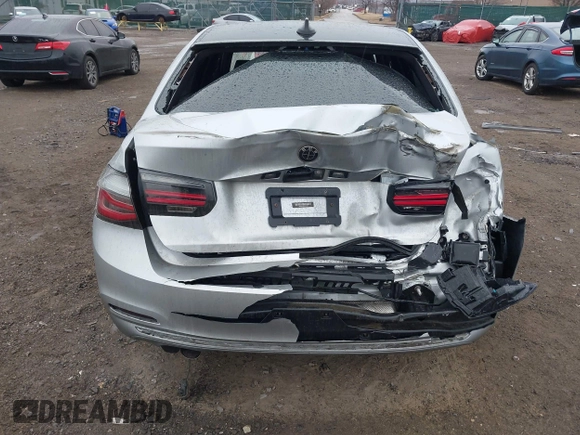 2018 BMW 3 Series 330i xDrive with VIN WBA8D9C55JA607605, listed as a IAAI auction lot 41682994 with 79,285 mi miles and . Bid and sale history available at DreamBid. Image 6.