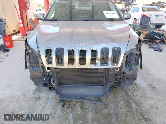 2015 Jeep Cherokee Latitude with VIN 1C4PJLCB1FW770806, listed as a IAAI auction lot 41887226 with 71,268 mi miles and . Bid and sale history available at DreamBid. Image 6.
