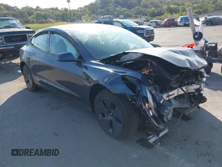 2023 Tesla Model 3 z VIN 5YJ3E1EA4PF656364, wystawiony jako IAAI lot #37851712 z przebiegiem Nie podano mil oraz . Historia ofert i sprzedaży dostępna na DreamBid. Obrazek 1.