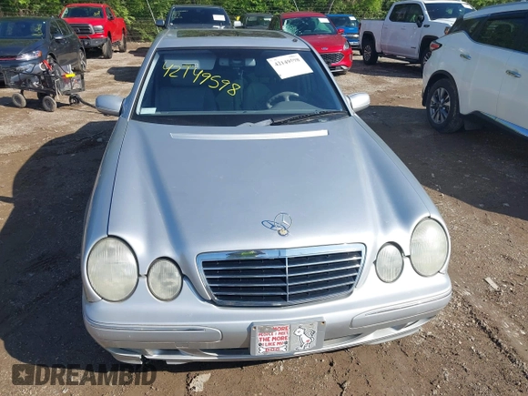 2001 Mercedes-Benz E-Class with VIN WDBJF65J61B373135, listed as a IAAI auction lot 42149598 with 123,314 mi miles. Bid and sale history available at carsss.com. Image 6.