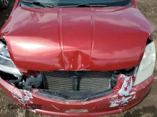 2010 Nissan Sentra S with VIN 3N1AB6AP8AL671968, listed as a Copart auction lot 52311125 with 129,789 mi miles and Salvage Title. Bid and sale history available at carsss.com. Image 11.