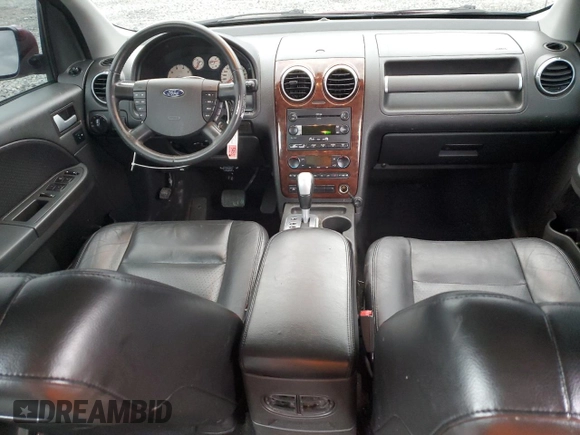 2005 Ford Freestyle Limited z VIN 1FMDK06165GA06262, wystawiony jako Copart lot #52496885 z przebiegiem 161 759 mil mil oraz Szkoda całkowita • Salvage title. Historia ofert i sprzedaży dostępna na DreamBid. Obrazek 8.