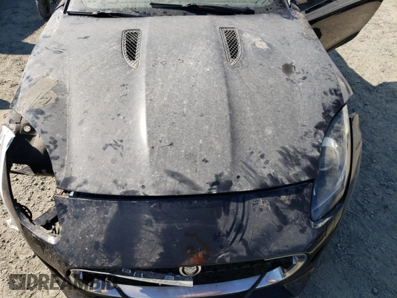 2014 Jaguar F-Type V6 with VIN SAJWA6E75E8K03346, listed as a Copart auction lot 69998944 with Not Provided miles and Salvage Title. Bid and sale history available at DreamBid. Image 11.