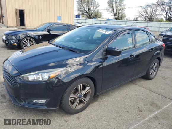2018 Ford Focus SE with VIN 1FADP3FEXJL215912, listed as a Copart auction lot 50518385 with 100,080 mi miles and Salvage Title. Bid and sale history available at carsss.com. Image 1.