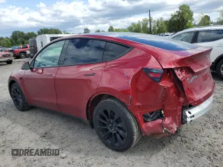 2024 Tesla Model Y Long Range with VIN 7SAYGDEE3RF196043, listed as a Copart auction lot 55693765 with 13,865 mi miles and Salvage title. Bid and sale history available at DreamBid. Image 2.
