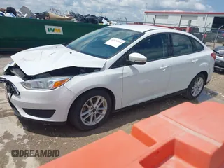 2016 Ford Focus SE z VIN 1FADP3F29GL346196, wystawiony jako IAAI lot #42171014 z przebiegiem 80 913 mil mil oraz . Historia ofert i sprzedaży dostępna na DreamBid. Obrazek 17.
