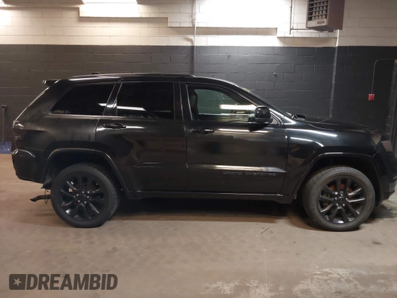 2021 Jeep Grand Cherokee Laredo X with VIN 1C4RJFAG3MC647726, listed as a IAAI auction lot 38421907 with 56,514 mi miles and . Bid and sale history available at DreamBid. Image 13.