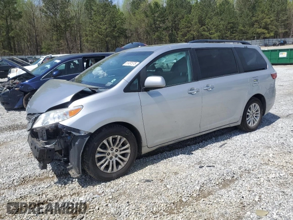 2015 Toyota Sienna XLE with VIN 5TDYK3DC4FS559737, listed as a Copart auction lot 51481575 with 148,181 mi miles and Salvage Title. Bid and sale history available at carsss.com. Image 1.