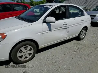 2011 Hyundai Accent GLS z VIN KMHCN4AC6BU614007, wystawiony jako Copart lot #53607545 z przebiegiem 138 593 mil mil oraz Szkoda całkowita • Salvage title. Historia ofert i sprzedaży dostępna na DreamBid. Obrazek 11.