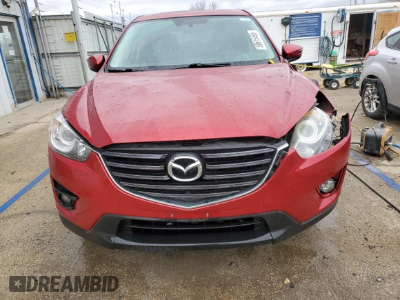 2016 Mazda CX-5 Grand Touring with VIN JM3KE4DY9G0771088, listed as a Copart auction lot 50615495 with 93,221 mi miles and Salvage Title. Bid and sale history available at DreamBid. Image 5.