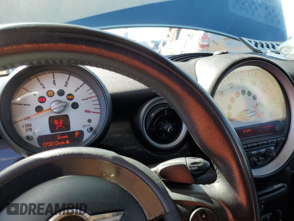 2011 MINI Hardtop S with VIN WMWSV3C57BTY13899, listed as a Copart auction lot 55802555 with 73,012 mi miles and Salvage title. Bid and sale history available at DreamBid. Image 9.