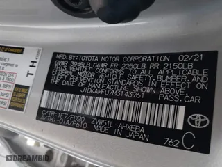 2021 Toyota Prius L Eco with VIN JTDKAMFU7M3143961, listed as a IAAI auction lot 41486032 with 58,979 mi miles. Bid and sale history available at carsss.com. Image 9.