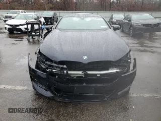 2025 BMW 8 Series M850i xDrive z VIN WBABC4C01SCT38959, wystawiony jako Copart lot #81842724 z przebiegiem Nie podano mil oraz Szkoda całkowita • Salvage title. Historia ofert i sprzedaży dostępna na DreamBid. Obrazek 5.