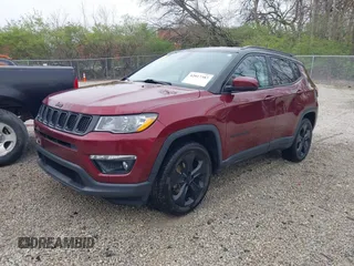 2021 Jeep Compass Altitude with VIN 3C4NJDBB6MT530958, listed as a IAAI auction lot 42017387 with 68,023 mi miles and . Bid and sale history available at DreamBid. Image 2.