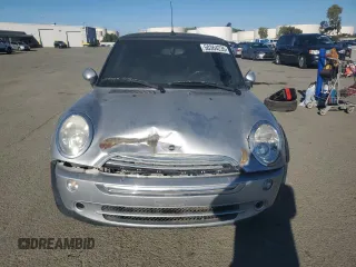 2005 MINI Convertible with VIN WMWRF33465TG10044, listed as a Copart auction lot 50364235 with 152,186 mi miles and Salvage title. Bid and sale history available at DreamBid. Image 5.