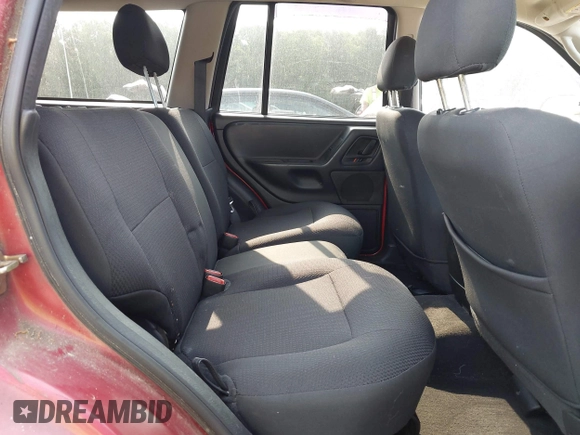2004 Jeep Grand Cherokee Laredo with VIN 1J4GW48S24C357110, listed as a IAAI auction lot 42395691 with 160,132 mi miles and . Bid and sale history available at DreamBid. Image 8.