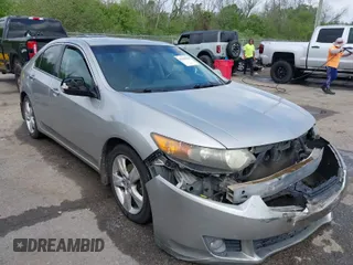 2009 Acura TSX with VIN JH4CU26619C021586, listed as a IAAI auction lot 41942680 with 171,841 mi miles. Bid and sale history available at carsss.com. Image 1.
