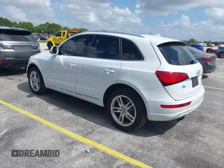 2014 Audi Q5 Premium Plus with VIN WA1LFAFP9EA124785, listed as a IAAI auction lot 42511649 with 99,109 mi miles and . Bid and sale history available at DreamBid. Image 3.