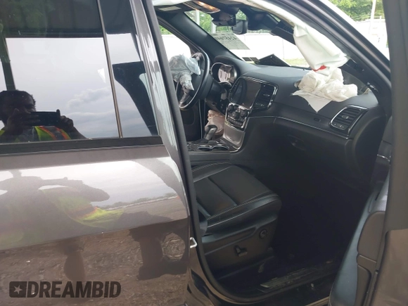 2021 Jeep Grand Cherokee 80th Anniversary with VIN 1C4RJFBG2MC612416, listed as a IAAI auction lot 42457040 with 35,441 mi miles and . Bid and sale history available at DreamBid. Image 5.