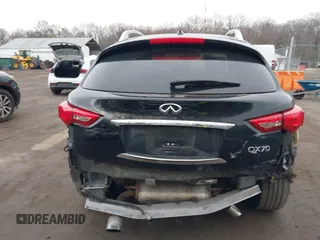 2016 Infiniti QX70 z VIN JN8CS1MWXGM752436, wystawiony jako IAAI lot #41681170 z przebiegiem 130 208 mil mil oraz . Historia ofert i sprzedaży dostępna na DreamBid. Obrazek 16.