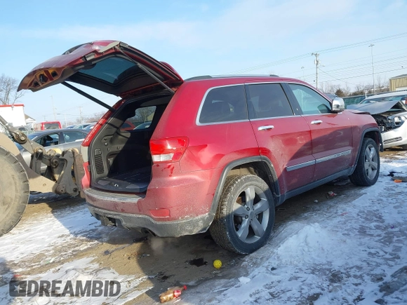 2013 Jeep Grand Cherokee Overland with VIN 1C4RJFCT3DC543862, listed as a IAAI auction lot 41370366 with 65,978 mi miles. Bid and sale history available at carsss.com. Image 4.