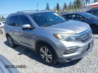 2016 Honda Pilot EX with VIN 5FNYF6H35GB001112, listed as a IAAI auction lot 42040410 with 206,424 mi miles. Bid and sale history available at carsss.com. Image 1.