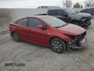 2022 Toyota Prius LE z VIN JTDKAMFP5N3213162, wystawiony jako Copart lot #82551774 z przebiegiem 55 173 mil mil oraz Szkoda całkowita • Salvage title. Historia ofert i sprzedaży dostępna na DreamBid. Obrazek 4.