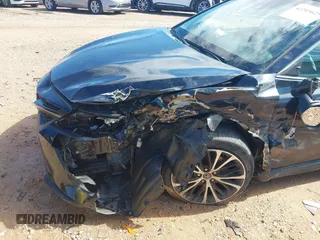 2018 Toyota Camry LE z VIN 4T1B11HKXJU652275, wystawiony jako IAAI lot #42245625 z przebiegiem 49 596 mil mil oraz . Historia ofert i sprzedaży dostępna na DreamBid. Obrazek 6.