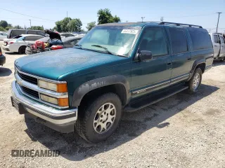 1999 Chevrolet Suburban with VIN 1GNFK16R5XJ512218, listed as a Copart auction lot 66417925 with 77,504 mi miles and Clean title. Bid and sale history available at DreamBid. Image 1.