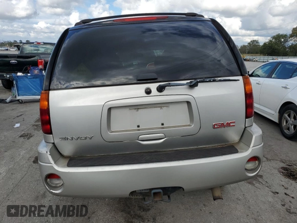 2006 GMC Envoy SLE with VIN 1GKDT13S462228967, listed as a Copart auction lot 73669484 with 233,349 mi miles and Salvage Title. Bid and sale history available at DreamBid. Image 6.