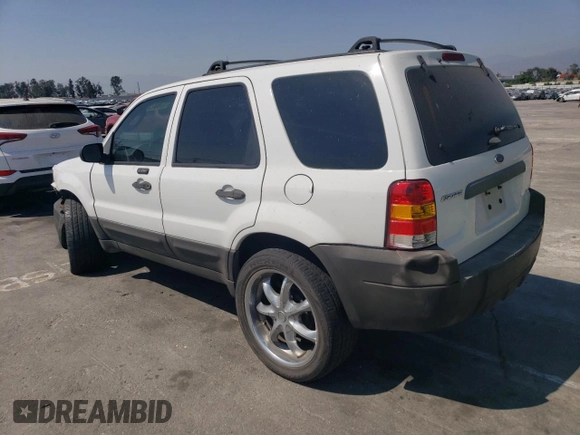 2006 Ford Escape XLS with VIN 1FMCU02Z36KA71926, listed as a Copart auction lot 57697364 with 225,212 mi miles and Salvage title. Bid and sale history available at DreamBid. Image 2.