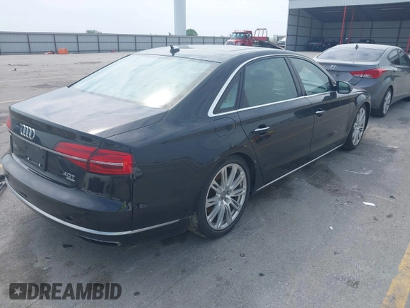 2015 Audi A8 4.0T with VIN WAU32AFD6FN002710, listed as a IAAI auction lot 42447149 with 109,791 mi miles and . Bid and sale history available at DreamBid. Image 4.
