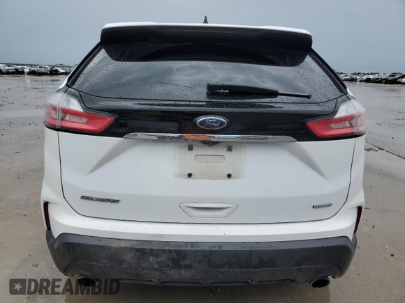 2020 Ford Edge SE z VIN 2FMPK3G95LBB06229, wystawiony jako Copart lot #54275935 z przebiegiem 89 807 mil mil oraz Szkody całkowita. Historia ofert i sprzedaży dostępna na DreamBid. Obrazek 6.