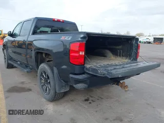 2017 Chevrolet Silverado 1500 LT with VIN 3GCUKREC7HG220780, listed as a IAAI auction lot 41978463 with 131,532 mi miles and . Bid and sale history available at DreamBid. Image 3.