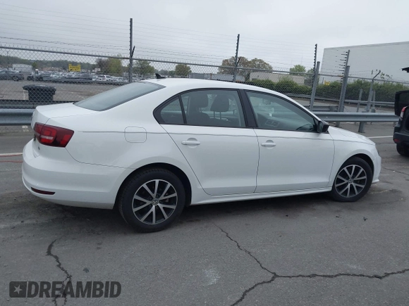 2016 Volkswagen Jetta Sedan 1.4T SE with VIN 3VWD67AJ6GM260584, listed as a IAAI auction lot 41903048 with 104,876 mi miles. Bid and sale history available at carsss.com. Image 13.