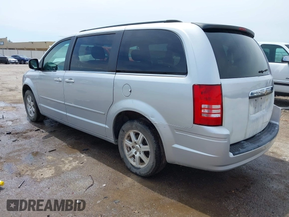 2008 Chrysler Town & Country Touring with VIN 2A8HR54P88R671360, listed as a IAAI auction lot 42104217 with 212,828 mi miles and . Bid and sale history available at DreamBid. Image 3.