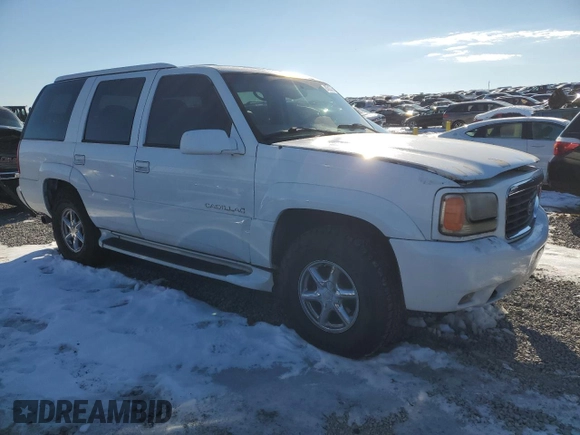 1999 Cadillac Escalade z VIN 1GYEK13R3XR406970, wystawiony jako Copart lot #87623365 z przebiegiem 189 339 mil mil oraz Szkoda całkowita • Salvage title. Historia ofert i sprzedaży dostępna na DreamBid. Obrazek 4.