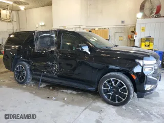 2022 Chevrolet Suburban RST with VIN 1GNSKEKD8NR206595, listed as a Copart auction lot 65003794 with 34,559 mi miles and Salvage Title. Bid and sale history available at carsss.com. Image 4.