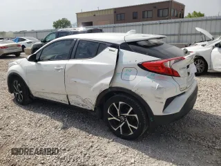 2018 Toyota C-HR XLE with VIN NMTKHMBXXJR041607, listed as a Copart auction lot 60540654 with 84,228 mi miles and Salvage Title. Bid and sale history available at DreamBid. Image 2.
