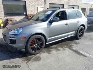 2009 Porsche Cayenne GTS with VIN WP1AD29P49LA61351, listed as a IAAI auction lot 40810730 with 213,628 mi miles. Bid and sale history available at carsss.com. Image 2.