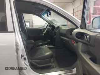 2004 Hyundai Santa Fe GLS with VIN KM8SC13E44U797943, listed as a IAAI auction lot 41731356 with 184,139 mi miles. Bid and sale history available at carsss.com. Image 5.