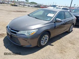 2016 Toyota Camry XLE with VIN 4T4BF1FK4GR581867, listed as a IAAI auction lot 42002126 with 74,811 mi miles. Bid and sale history available at carsss.com. Image 2.
